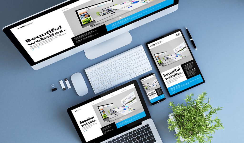 Different devices, desktop computer, laptop, tablet and smartphone with the same website loaded. Showing the importance of responsiveness in UI/UX Design